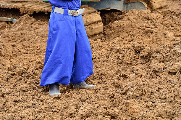 unique work pants in japan, work clothes of construction workers unique work pants in japan, work clothes of construction workers lazy construction laborer stock pictures, royalty-free photos & images