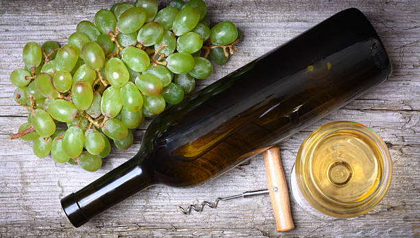 istock wine bottle, grapes and a glass of wine 500363370
