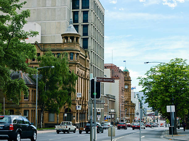 Hobart, Tasmania, Australia - January 31, 2009: Macquarie Street corner Murray Street, near St. Davis Cathedral. No people, cars passing on a busy street in Hobart.