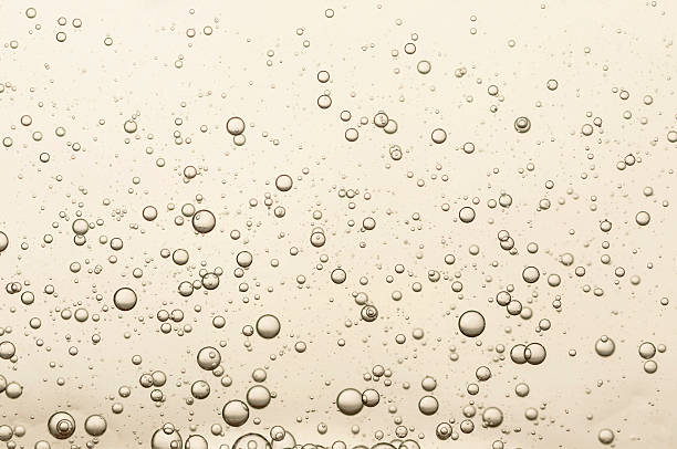 Many small champagne bubbles Many small champagne bubbles in a glass of champagne champagne stock pictures, royalty-free photos & images