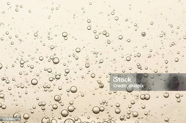 Many Small Champagne Bubbles Stock Photo - Download Image Now - Bubble, Champagne, Backgrounds