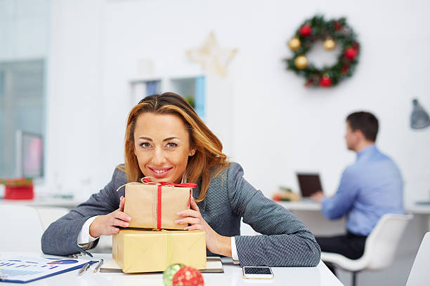 istock Happy employee with gifts 500365084