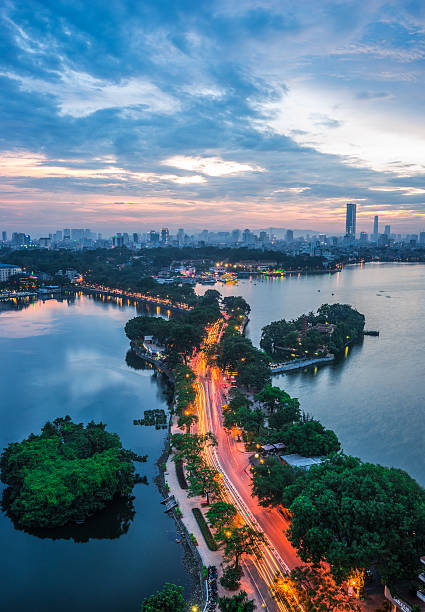 Has Us Cityscape Urban night in Ha Noi City, the capital of Viet Nam hanoi stock pictures, royalty-free photos & images