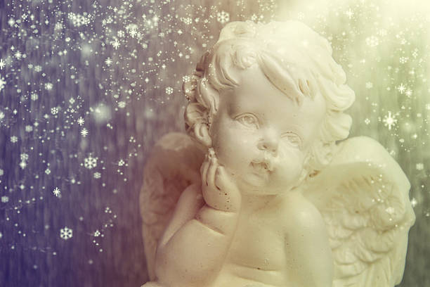 istock Little white angel on a silver background. 500365974