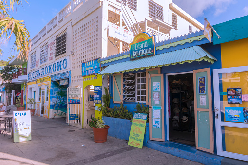Isla Culebra, Puerto Rico - January 23, 2014: Shops offering souvenirs, clothing accessories, kayaks, bikes, and snorkels open their doors in wait for more tourists to arrive by ferry boat on Isla Culebra.