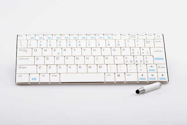 istock White wi fi keyboard and stylus pen on white background 500370120