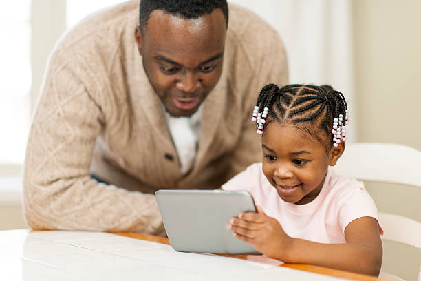 istock African American father and daughter 500374035