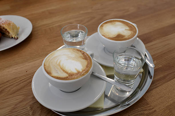 istock Glasses of cappuccino and water 500376319