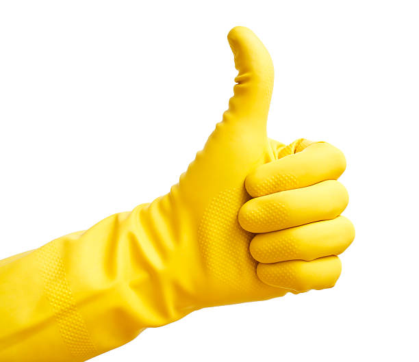 istock Thumbs up with a yellow vinyl glove 500376531