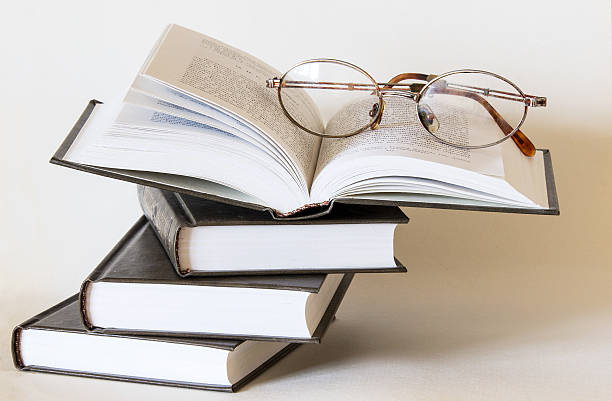 Books with glasses stock photo