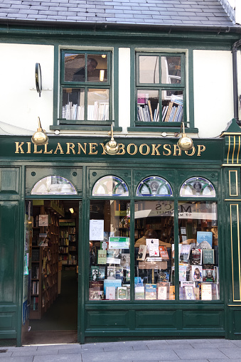 Killarney, Ireland - July 25, 2009: Historic bookstore. These colorful houses are typical for the touristic region County Kerry and the Ring of Kerry peninsula.