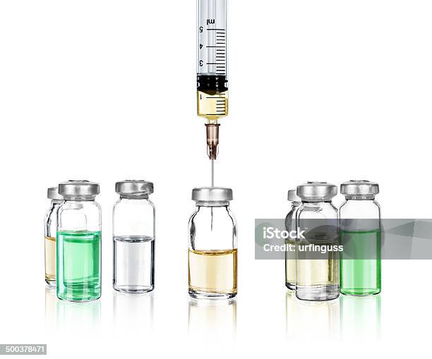 Medical Ampoules And Syringe Isolated On White Stock Photo - Download Image Now - Ampoule, Care, Dose