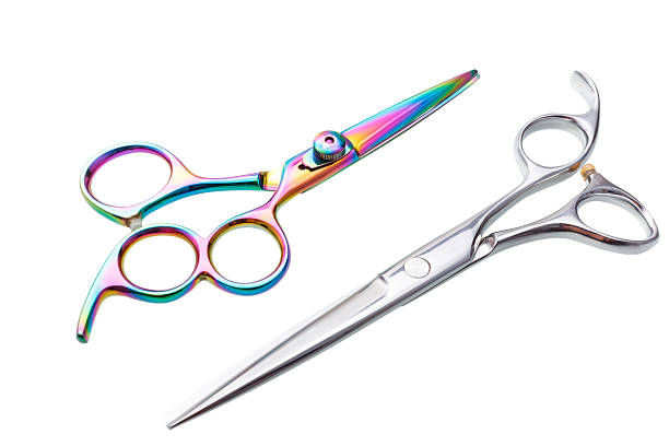 istock Two sets of Professional hairdressing scissors isolated, with clipping path 500380585