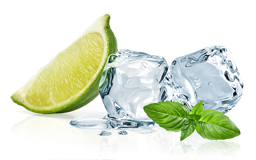 Ice cubes,lime wedge and basil leaves isolated on white background