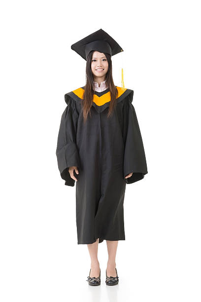 istock Beautiful smiling young graduation woman standing. 500389947
