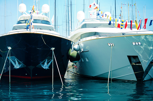 Luxury yachts moored in the harbour.