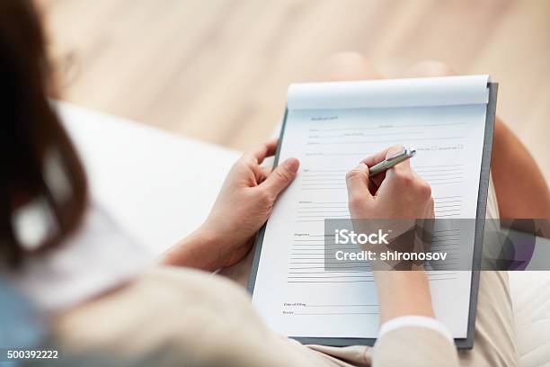 Medical Record Stock Photo - Download Image Now - Questionnaire, Document, Form Filling