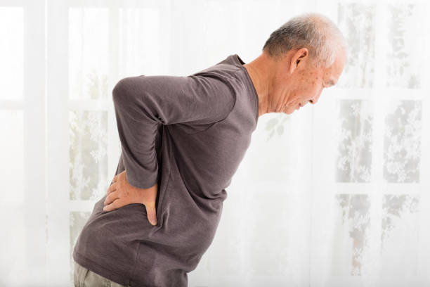 istock senior man with Pain in back 500393626