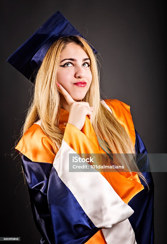 Young and Beautiful Female Graduate Young and beautiful female graduate thinking what to to in future after graduation 20-24 Years Stock Photo
