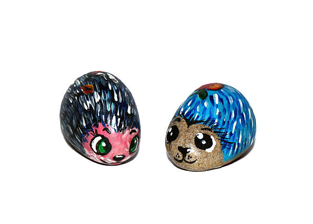 istock Souvenir - a pair of stone colored hedgehogs 500395277