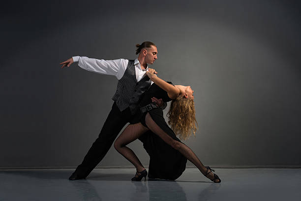 istock man and woman dancing 500396750