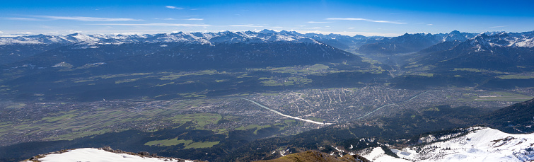 Panoramic shot of the city of Innsbruck seen from Nordkette mountains.