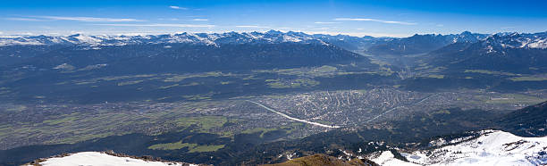 Innsbruck panorama Panoramic shot of the city of Innsbruck seen from Nordkette mountains. inn river stock pictures, royalty-free photos & images