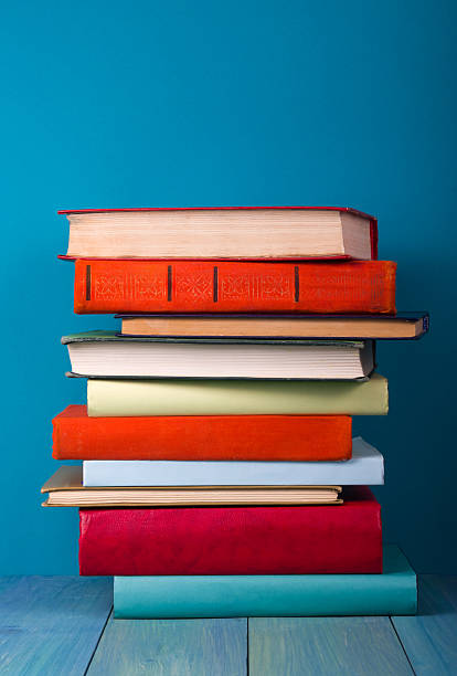 istock Stack of colorful books, grungy blue background, free copy space 500400842