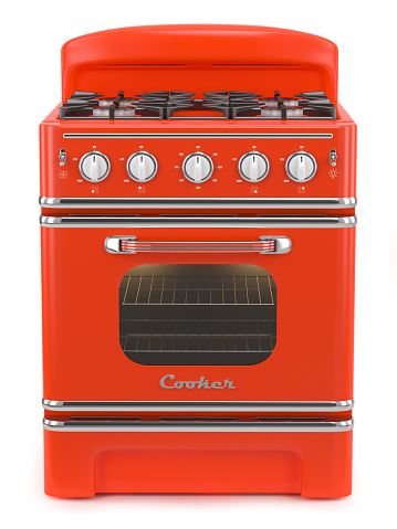 Red retro stove isolated on white background