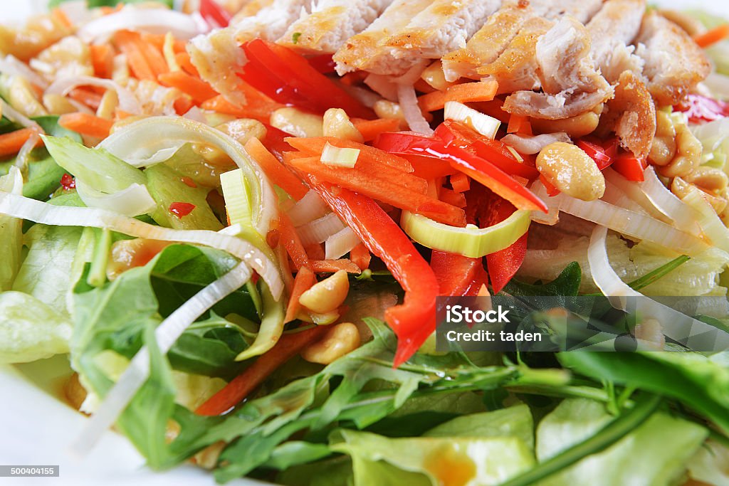 salad of fried chicken fresh salad of fried chicken, spinach and nuts Appetizer Stock Photo