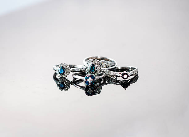 istock Old fashion rings on reflective background 500405443