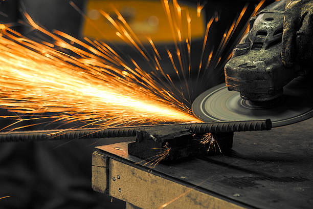 Grinding with sparks Grinding with sparks oxyacetylene stock pictures, royalty-free photos & images