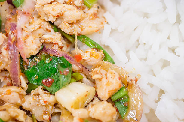 istock Thai spicy chicken salad with rice 500407255