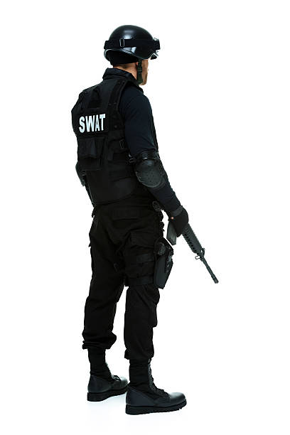 istock Rear view of police looking away 500408199