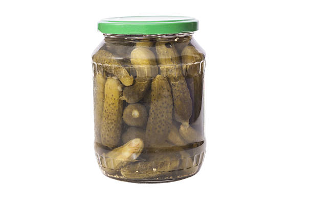 istock Jar of Green pickled cucumber marinated 500408615