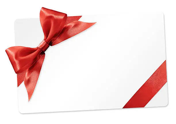 Photo of gift card with red ribbon bow Isolated on white background