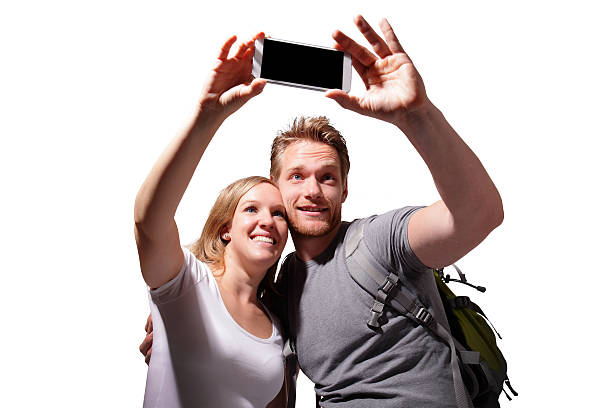 istock happy couple selfie by smart phone 500425567