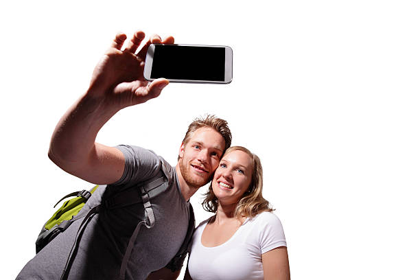 istock happy couple selfie by smart phone 500425569