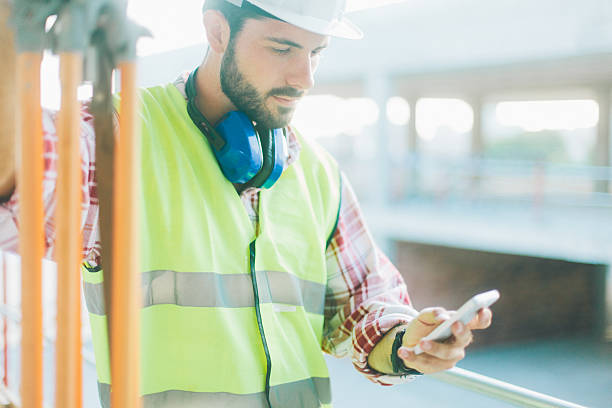 istock Land surveyor using app on smart phone. 500425966