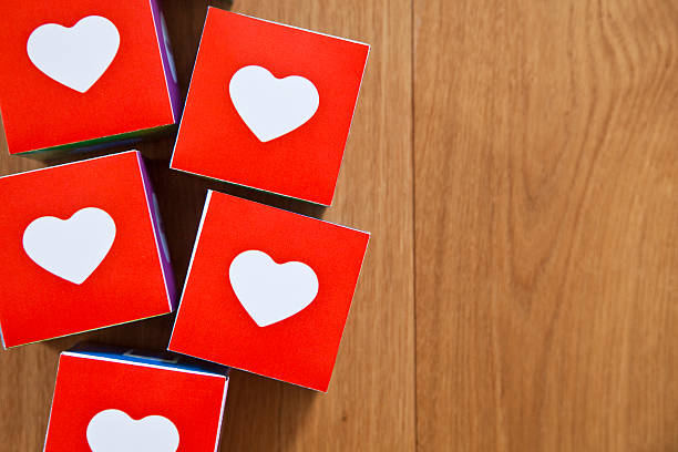 istock Heart cubes on wooden background 500426251