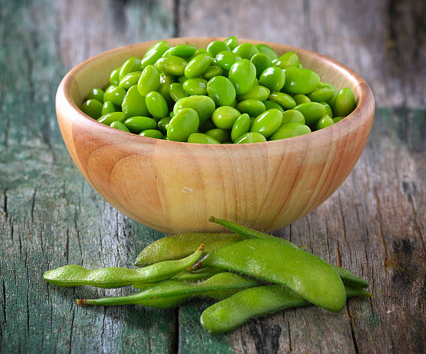 istock green soy beans in the wood bowl on table 500426810