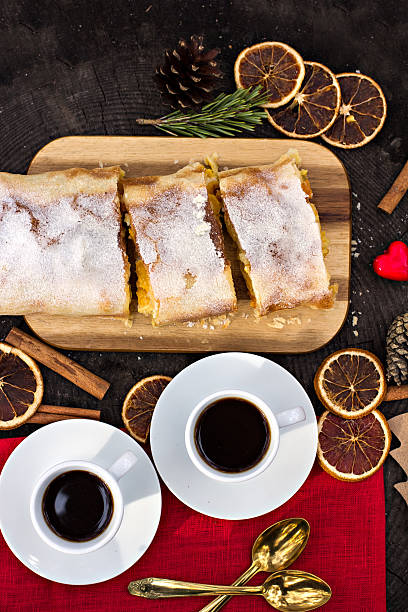 istock Strudel with custard and orange. Christmas Stollen. Christmas table decoration. 500427144
