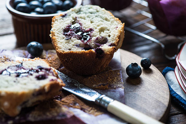 istock Fresh homemade blueberry muffin, cut in half 500427254