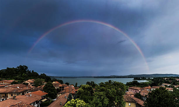 istock Biandronno, rainbow over Varese lake 500427823
