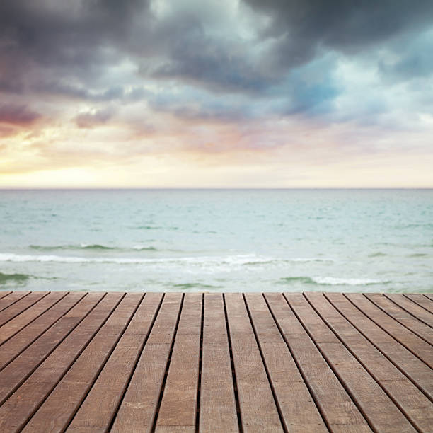 istock Sea, sand and wooden pier perspective 500427840