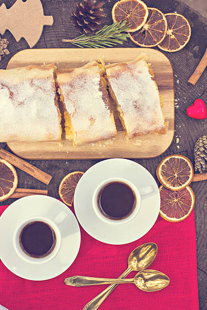 istock Strudel with custard and orange. Christmas Stollen. Christmas table decoration. 500428372