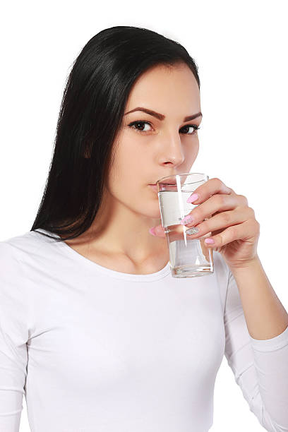 istock girl drinking water 500428804