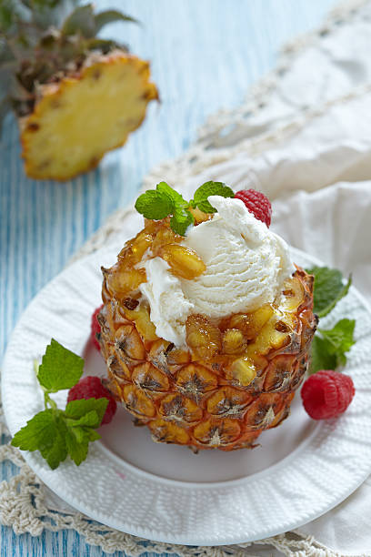 istock Fruit sorbet ice cream in small pineapple 500429065
