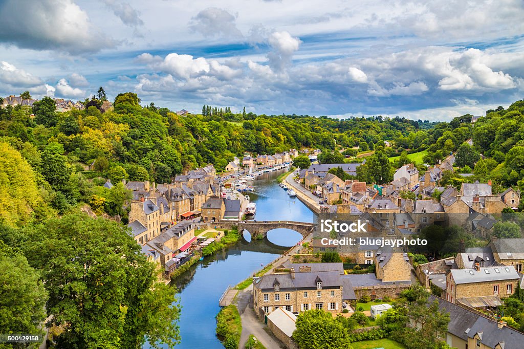 Historic town of Dinan, Bretagne, France Aerial view of the historic town of Dinan with Rance river with dramatic cloudscape, Cotes-d'Armor department, Bretagne, northwestern France. France Stock Photo