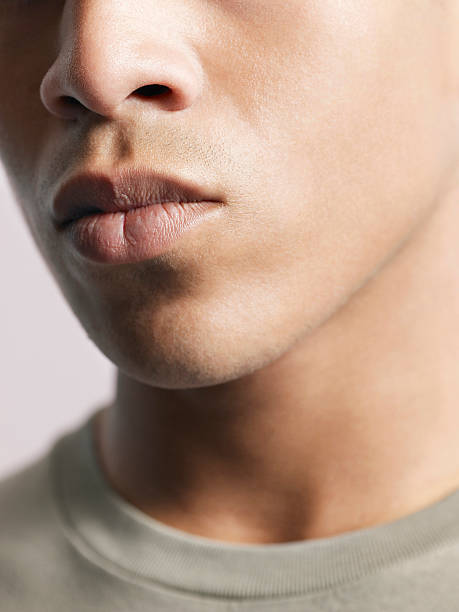 istock Young African American Man's Lips 500429571